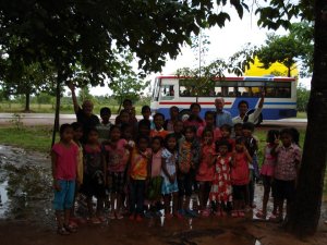 Students embarking on their first bus excursion.